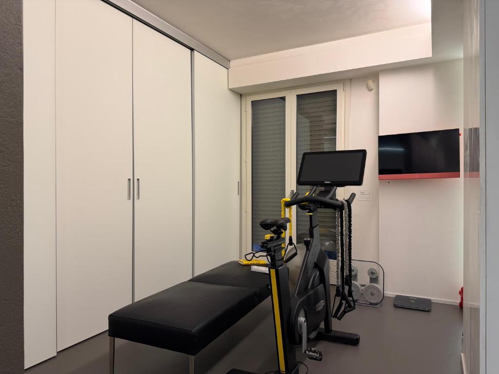Zona benessere con attrezzatura Tecnogym